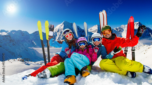 Photo: Skiing, winter fun - happy family ski team Skiing, winter fun - happy family ski team