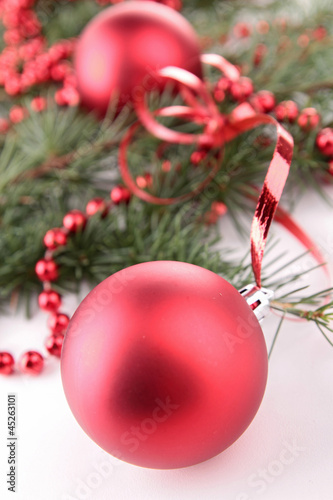 Photo: pine branch and bauble pine branch and bauble