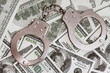 Dollars and handcuffs