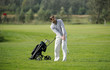 Golf player strikes a good shot