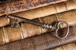 Photo: Rusty key on old books Rusty key on old books