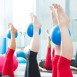 Photo: Aerobics pilates women feet with yoga balls Aerobics pilates women feet with yoga balls