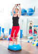 Bosu ball for fitness instructor woman in aerobics