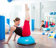 Bosu ball for fitness instructor woman in aerobics