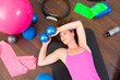 Aerobics woman tired resting lying on mat