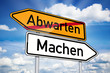 Wegweiser mit Abwarten und Machen