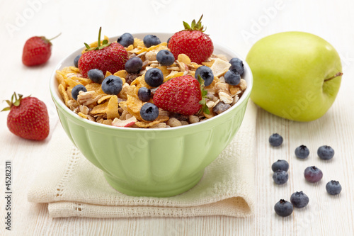 Photo: Bowl of healthy muesli and fresh berries Bowl of healthy muesli and fresh berries