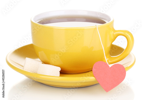 Photo: Yellow cup and saucer isolated on white Yellow cup and saucer isolated on white