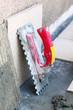 mortar on wall construction notched trowel