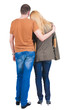 Back view of embrace of a young couple