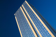 Foto: Skyscraper on a background of clear blue sky Skyscraper on a background of clear blue sky