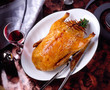 Roast duck on plate