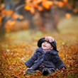Photo: Little girl portrait in autumn park Little girl portrait in autumn park