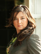 busineeslady in grey pantsuit portrait