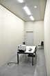Empty room with a computer on the table