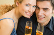 Cheerful couple with champagne