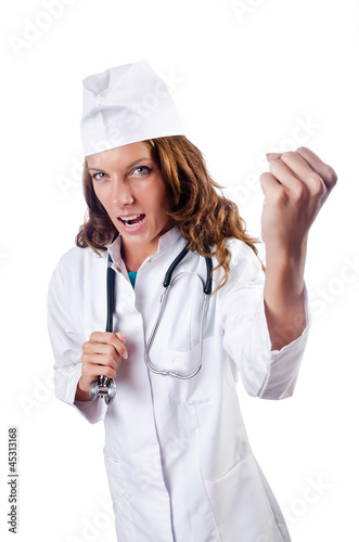 Photo: Attrative woman doctor isolated on white Attrative woman doctor isolated on white