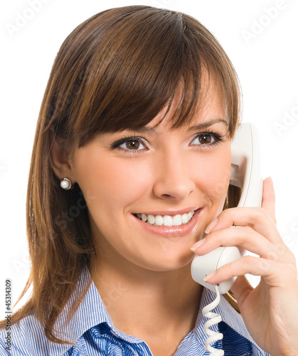 Photo: Cheerful businesswoman with phone, isolated Cheerful businesswoman with phone, isolated