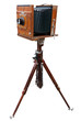 Wooden classic camera on tripod. Clipping path.