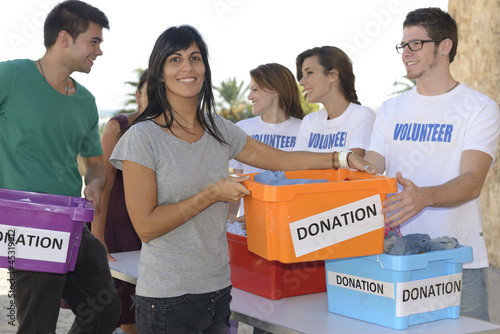Photo: Group of volunteers collecting clothing donations Group of volunteers collecting clothing donations