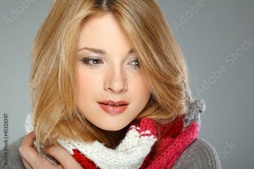 Photo: A photo of beautiful girl is in winter clothes A photo of beautiful girl is in winter clothes