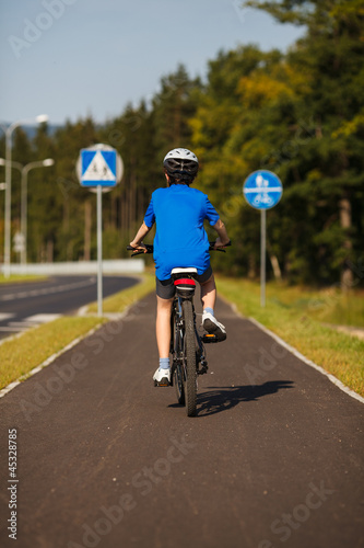 Photo: Boy biking Boy biking