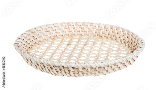 Photo: Wickerwork empty yellow breadbasket on white background Wickerwork empty yellow breadbasket on white background
