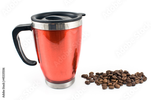 Photo: Red thermos with coffee beans Red thermos with coffee beans