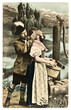 funny flirting couple in typical bavarian dress