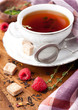 Cup of tea with herbs and berries