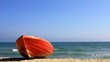Red boat on beach