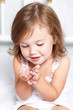 Photo: Girl holding golden ring Girl holding golden ring