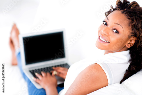 Photo: Woman working on a laptop Woman working on a laptop