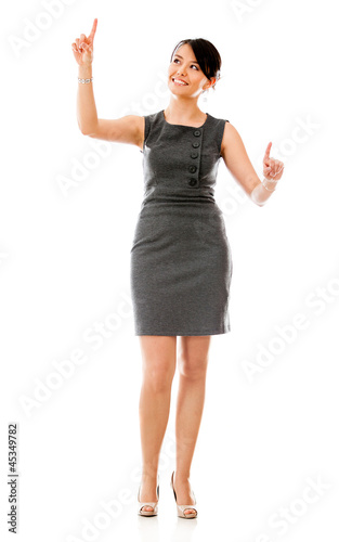 Photo: Business woman touching a screen Business woman touching a screen
