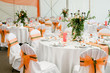 an image of tables setting at a luxury wedding hall