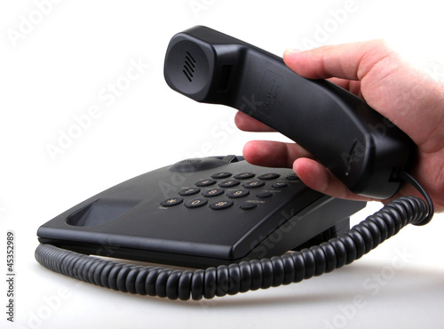 Photo: telephone isolated over white background. telephone isolated over white background.