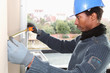 Wall measuring worker