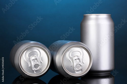 Photo: aluminum cans on blue background aluminum cans on blue background