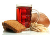 tankard of kvass and rye breads with ears, isolated on white