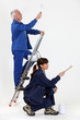 female painter with mature instructor