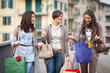 Three Beautiful Young Women with Shopping Bags