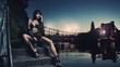 Photo: Sexy brunette sitting by the river Sexy brunette sitting by the river