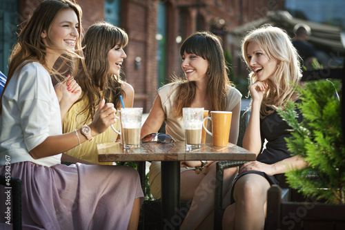 Photo: Four girls enjoying the meeting Four girls enjoying the meeting