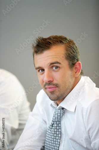 Photo: businessman in his office businessman in his office