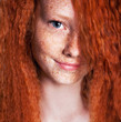 Foto: Portrait of young smiling freckled girl Portrait of young smiling freckled girl