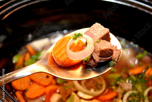Photo: Spoonful of Cooking Stew Ingredients Spoonful of Cooking Stew Ingredients