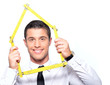 business concept homme avec un mètre en bois