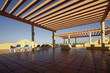 Empty Chairs On A Terrace