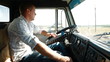 Lorry driver at the wheel of truck