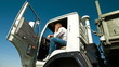 Truck Driver in Cab Using Mobile Phone